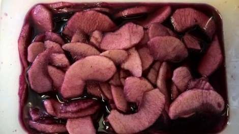 Apple slices in red wine
